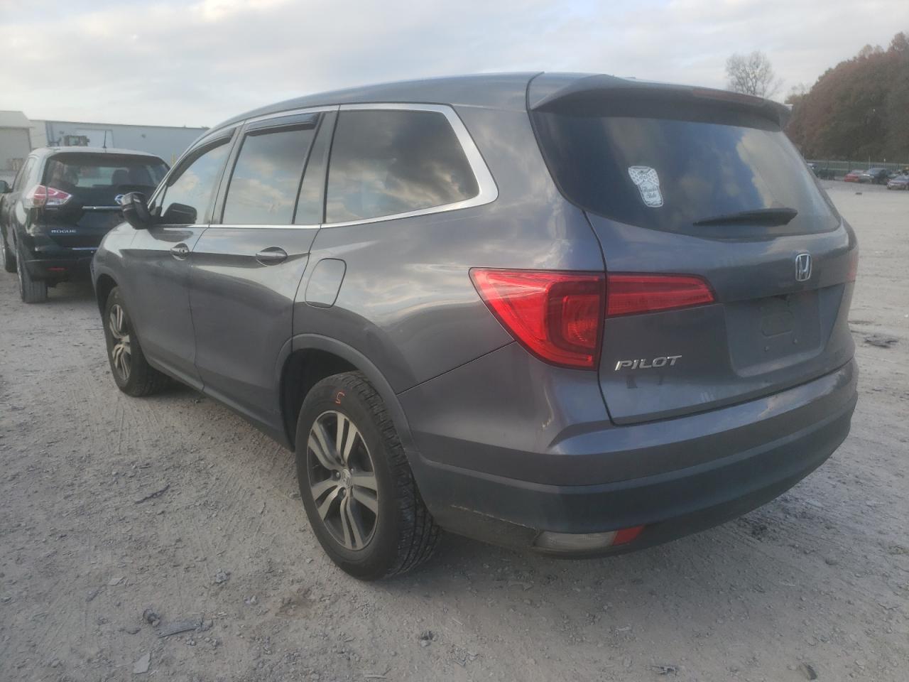 Photo 3 from auction – 2016 HONDA PILOT EXL with VIN 5FNYF5H66GB021373