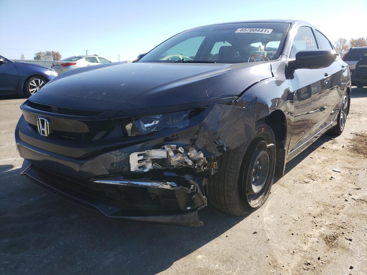 Photo 2 from auction – 2021 HONDA CIVIC LX with VIN 2HGFC2F63MH557013
