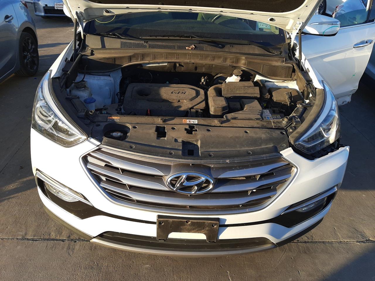 Photo 7 from auction – 2017 HYUNDAI SANTA FE S with VIN 5NMZU3LB5HH035462