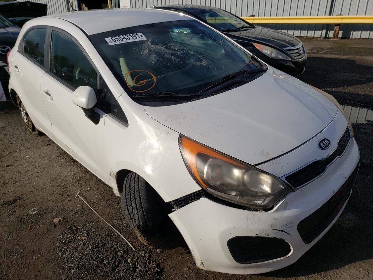 KIA RIO EX 2012 with VIN KNADN5A38C6082793 - Photo from auction