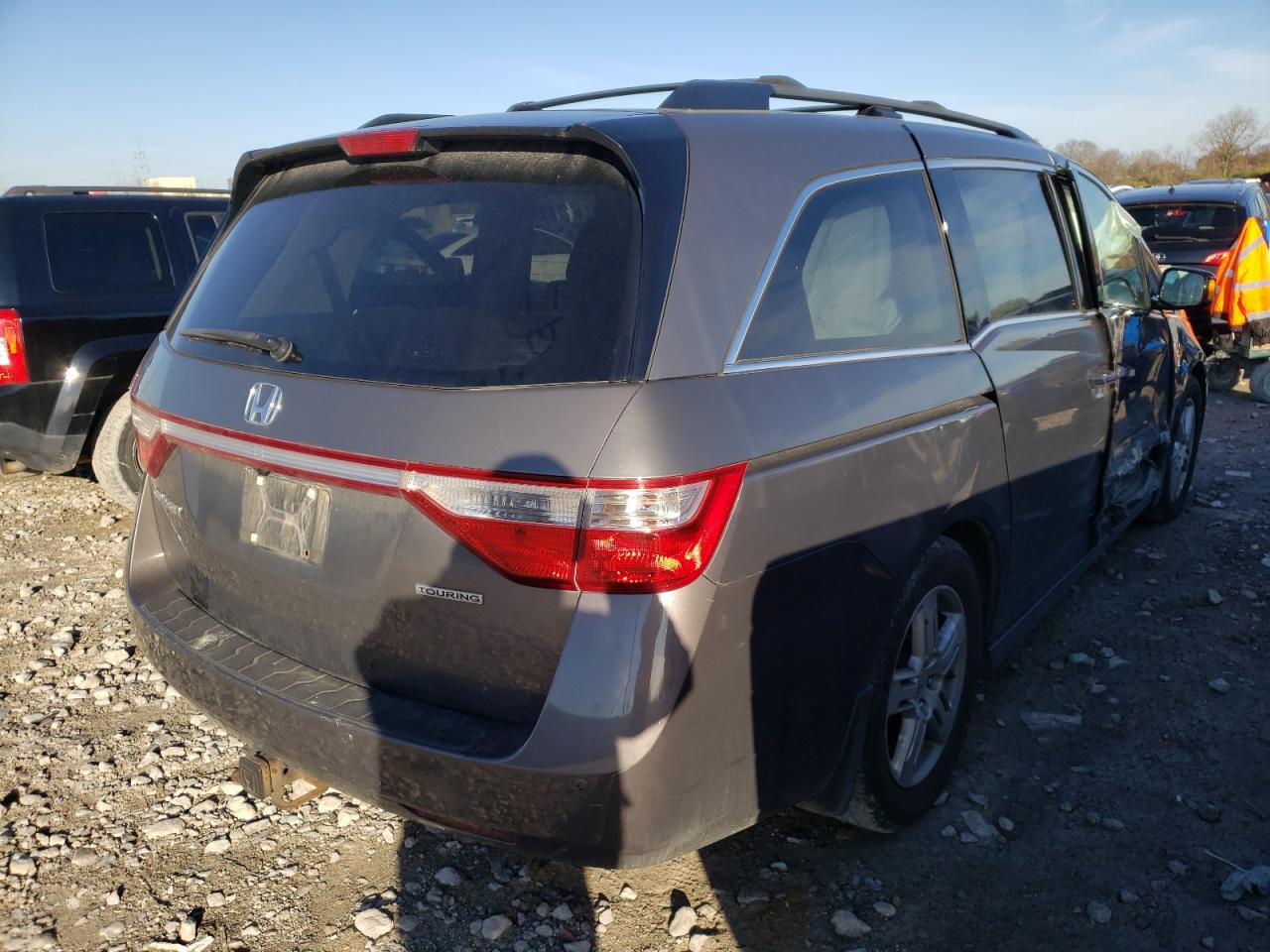 Photo 4 from auction – 2011 HONDA ODYSSEY TO with VIN 5FNRL5H91BB012192