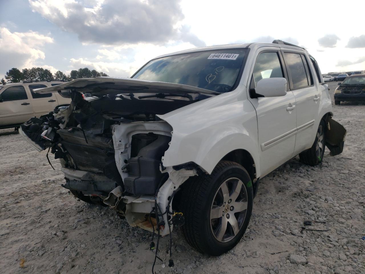 Photo 2 from auction – 2015 HONDA PILOT TOUR with VIN 5FNYF3H93FB013700