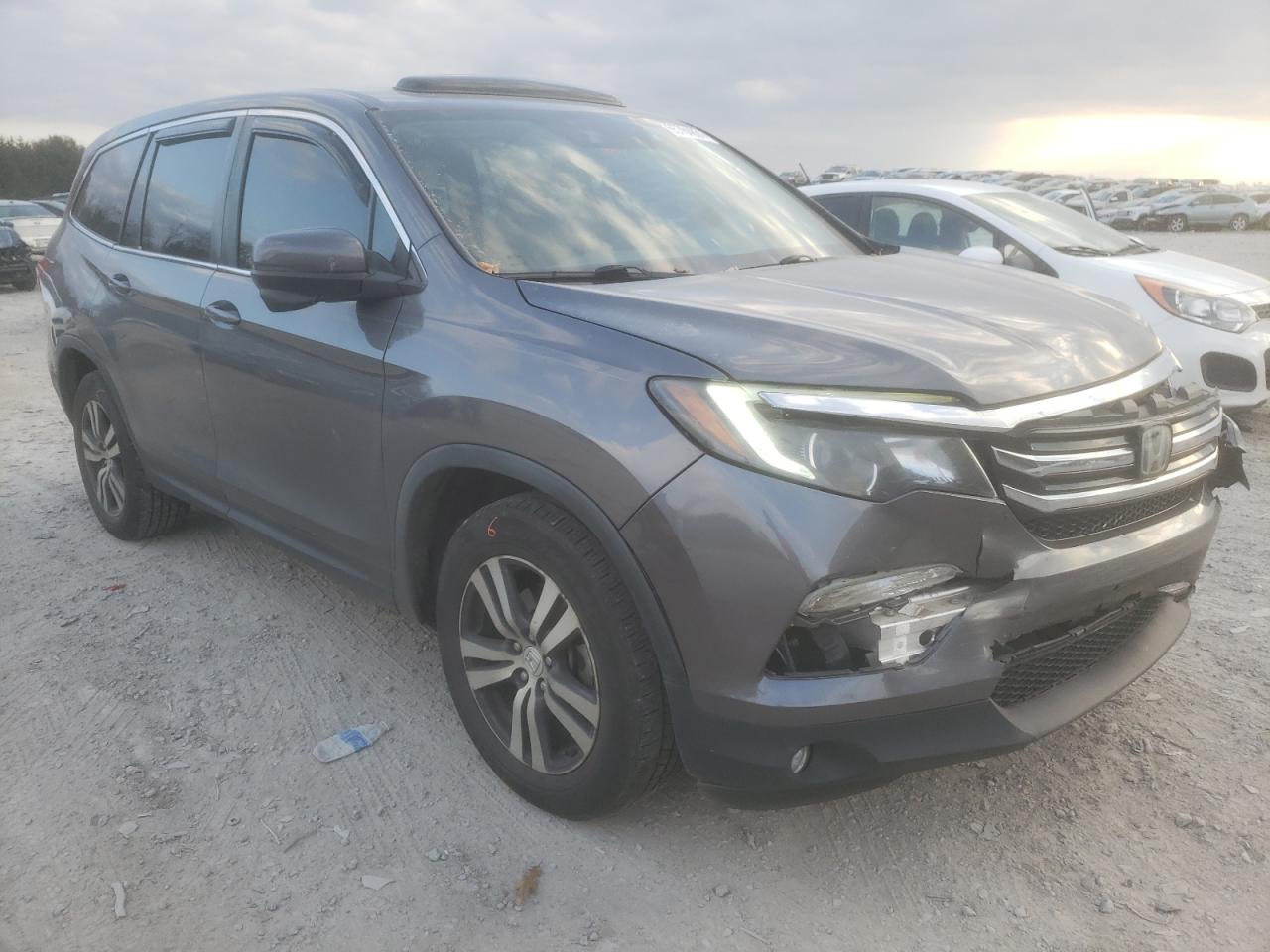HONDA PILOT EXL 2016 with VIN 5FNYF5H66GB021373 - Photo from auction