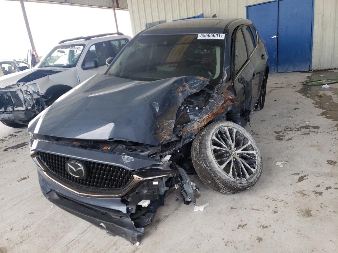Photo 2 from auction – 2021 MAZDA CX-5 TOURI with VIN JM3KFBCM2M0452725