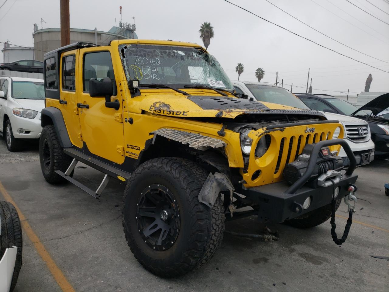 JEEP WRANGLER U 2015 with VIN 1C4BJWDG4FL698619 - Photo from auction