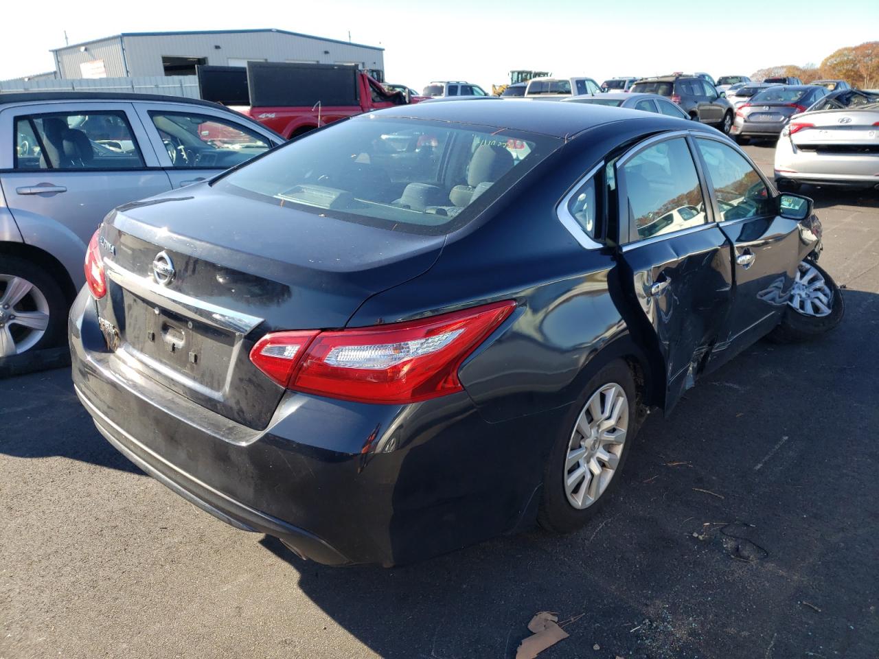 Photo 4 from auction – 2016 NISSAN ALTIMA 2.5 with VIN 1N4AL3AP4GC261199