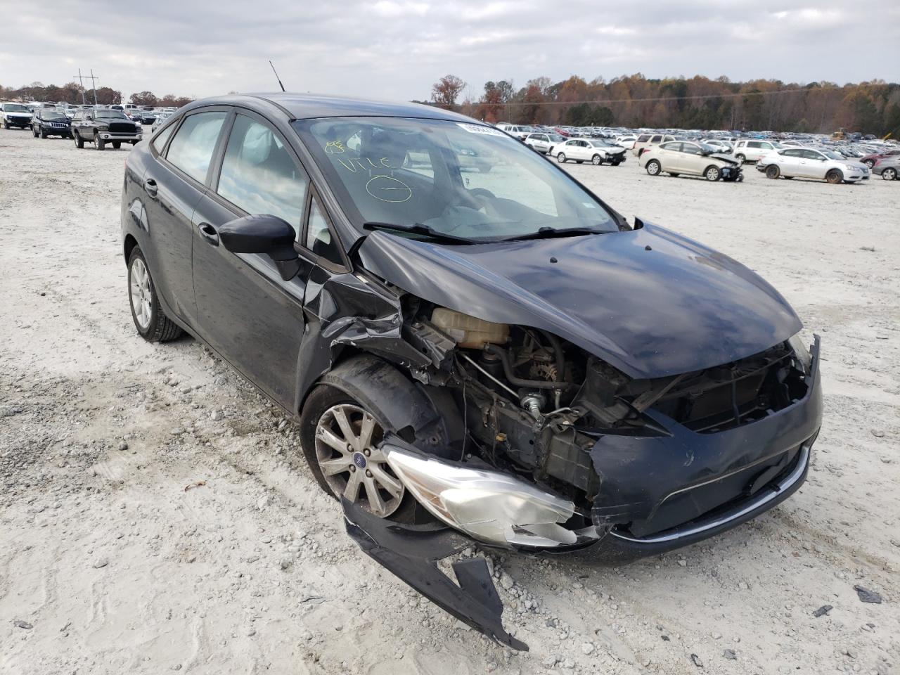 FORD FIESTA SE 2012 with VIN 3FADP4BJ4CM147472 - Photo from auction