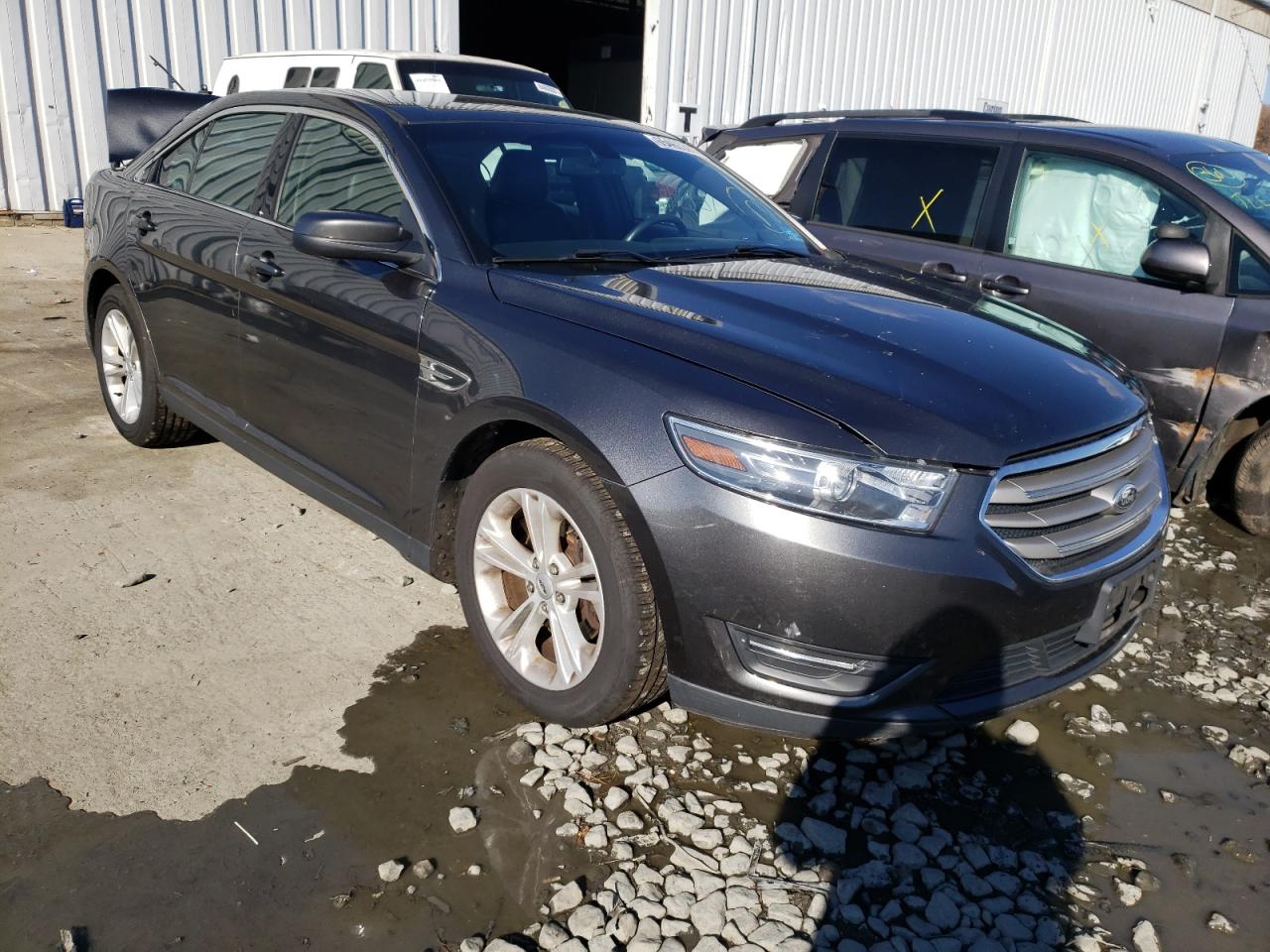 FORD TAURUS SEL 2015 with VIN 1FAHP2E89FG182330 - Photo from auction