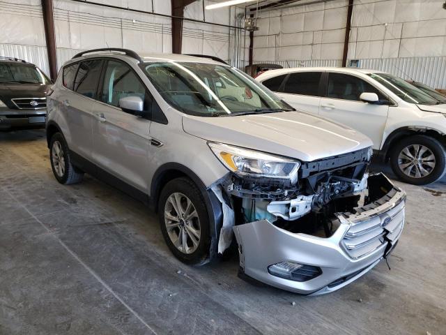 FORD ESCAPE SE 2018 with VIN 1FMCU0GD9JUC12573 - Photo from auction