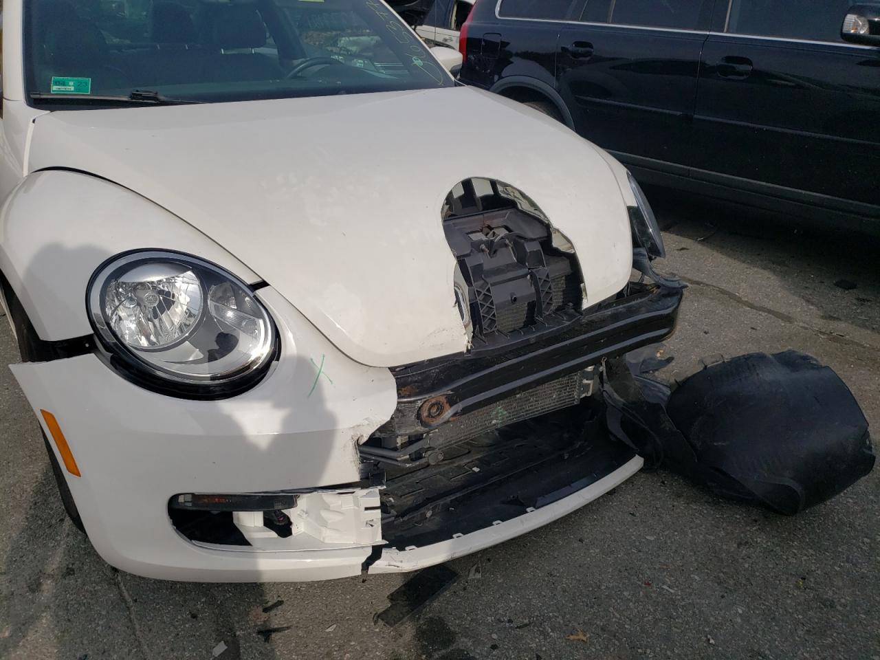 Photo 9 from auction – 2012 VOLKSWAGEN BEETLE with VIN 3VWHP7AT9CM654588