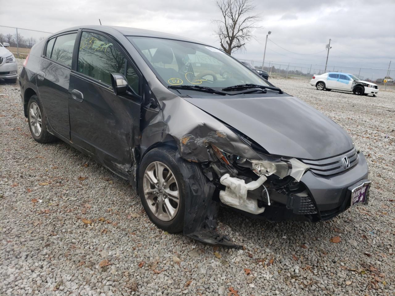 HONDA INSIGHT EX 2010 with VIN JHMZE2H74AS026577 - Photo from auction