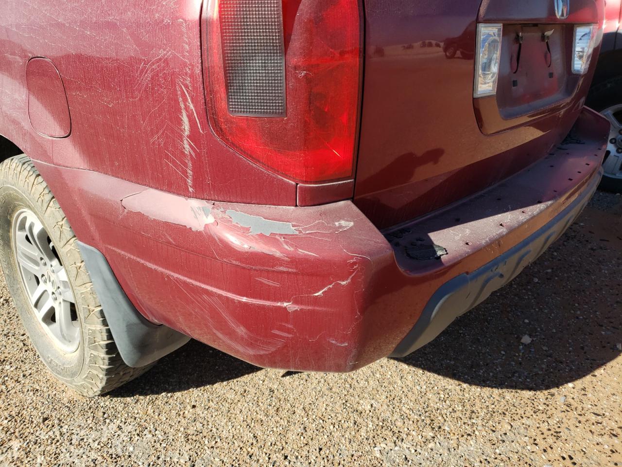 Photo 9 from auction – 2004 HONDA PILOT EX with VIN 2HKYF18474H558919