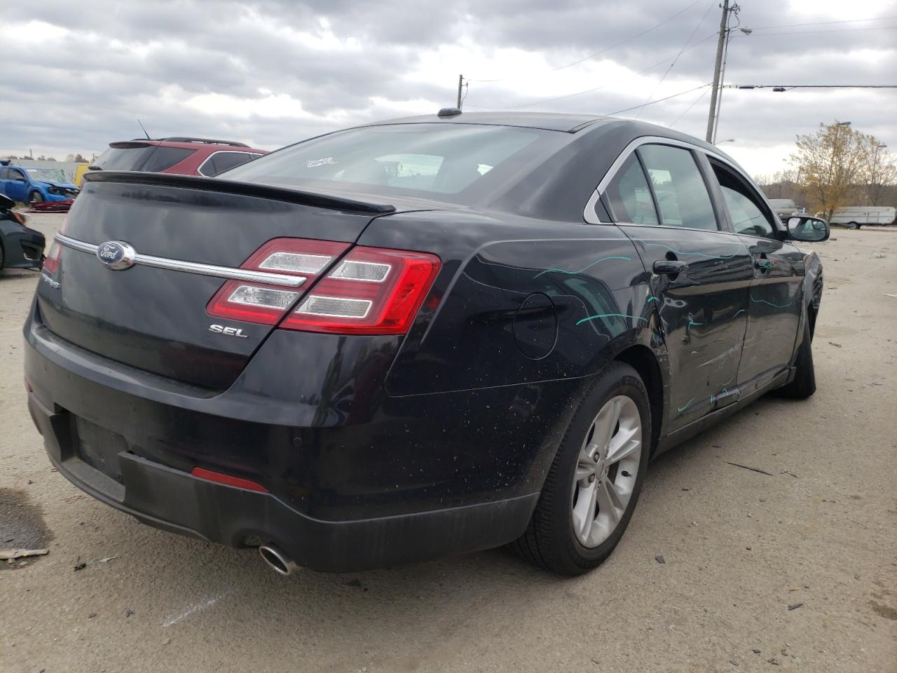 Photo 4 from auction – 2014 FORD TAURUS SEL with VIN 1FAHP2H88EG119326
