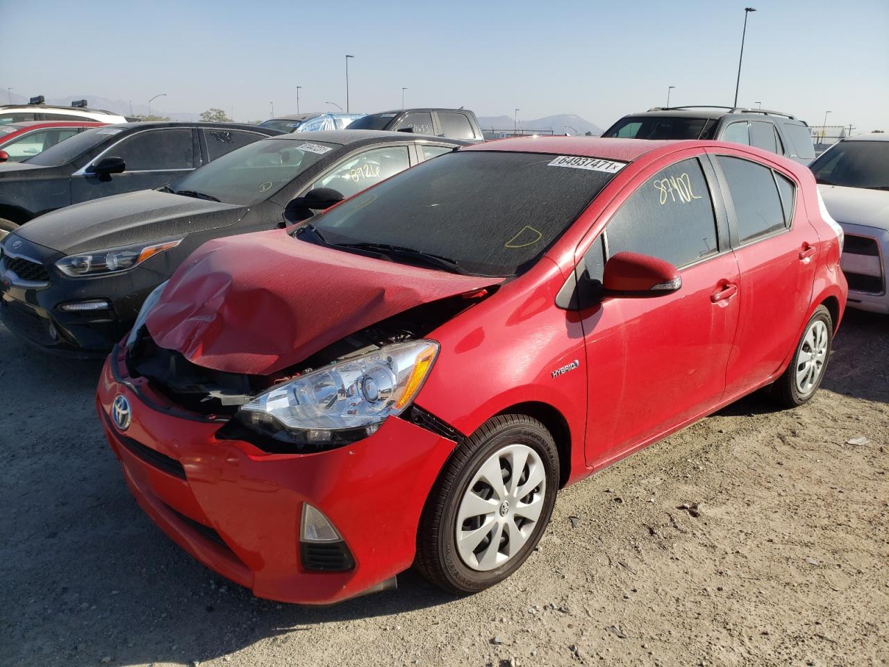 Photo 2 from auction – 2012 TOYOTA PRIUS C with VIN JTDKDTB31C1500754