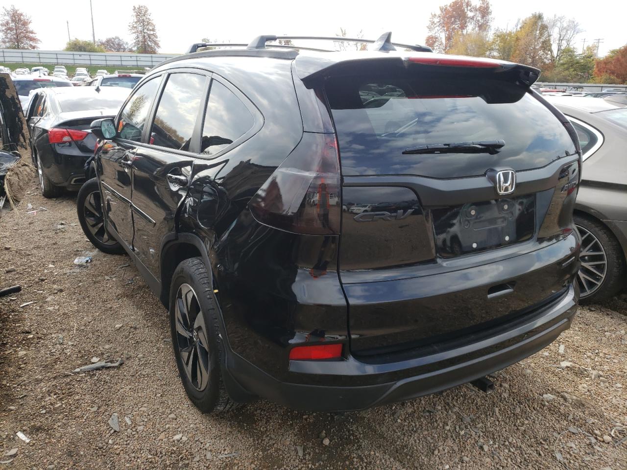 Photo 3 from auction – 2016 HONDA CR-V TOURI with VIN 5J6RM4H93GL017688