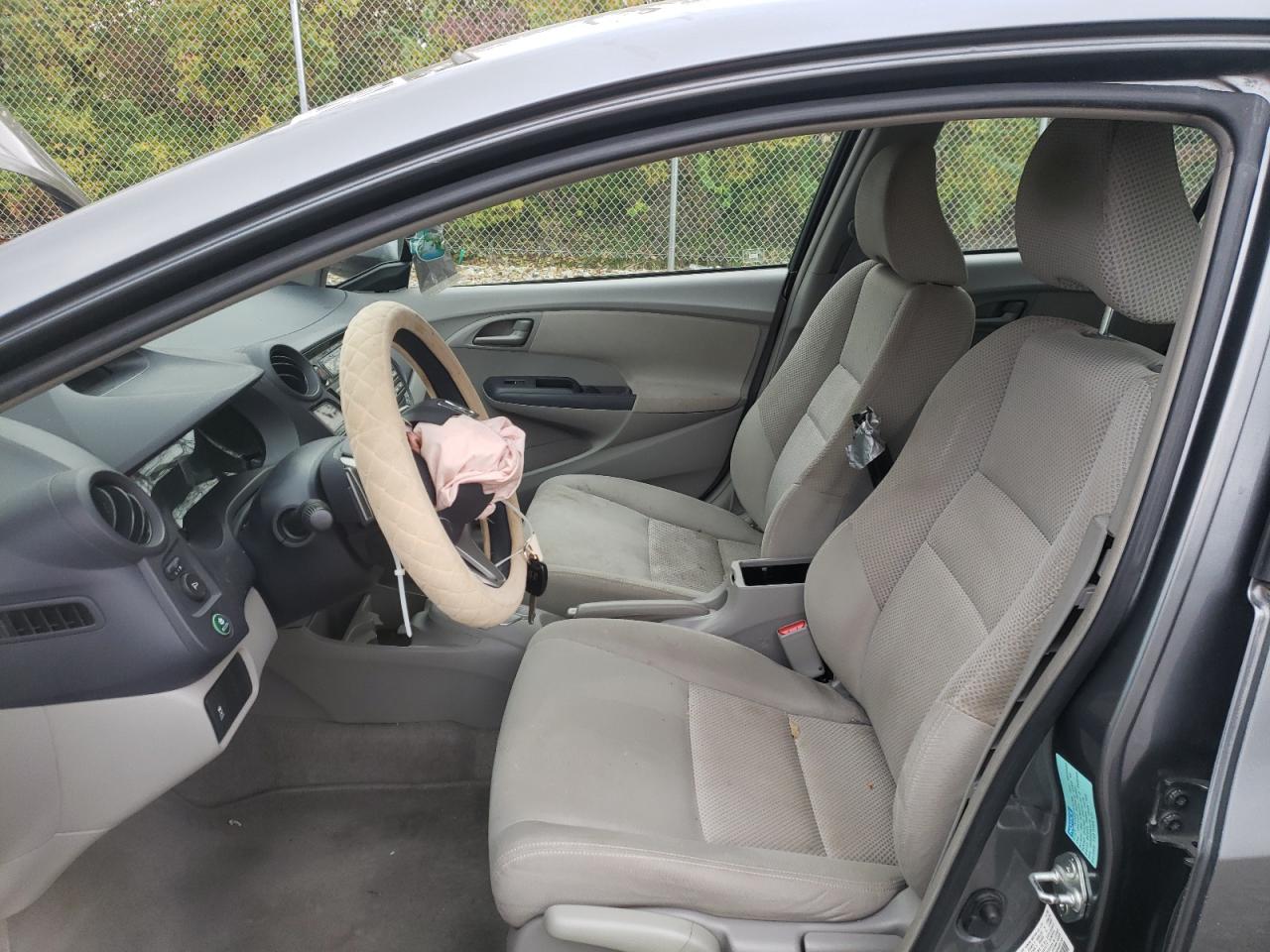 Photo 5 from auction – 2010 HONDA INSIGHT EX with VIN JHMZE2H74AS026577