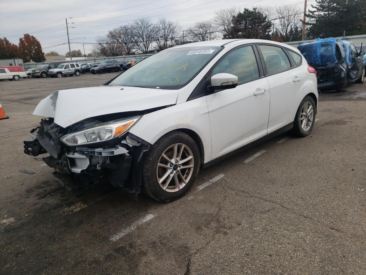 Photo 2 from auction – 2016 FORD FOCUS SE with VIN 1FADP3K23GL338357