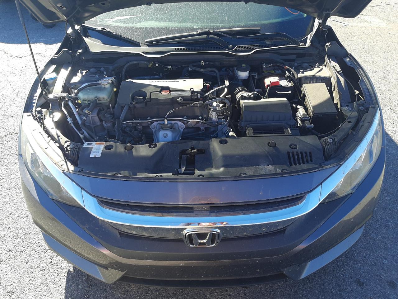 Photo 7 from auction – 2018 HONDA CIVIC LX with VIN 19XFC2F57JE002966