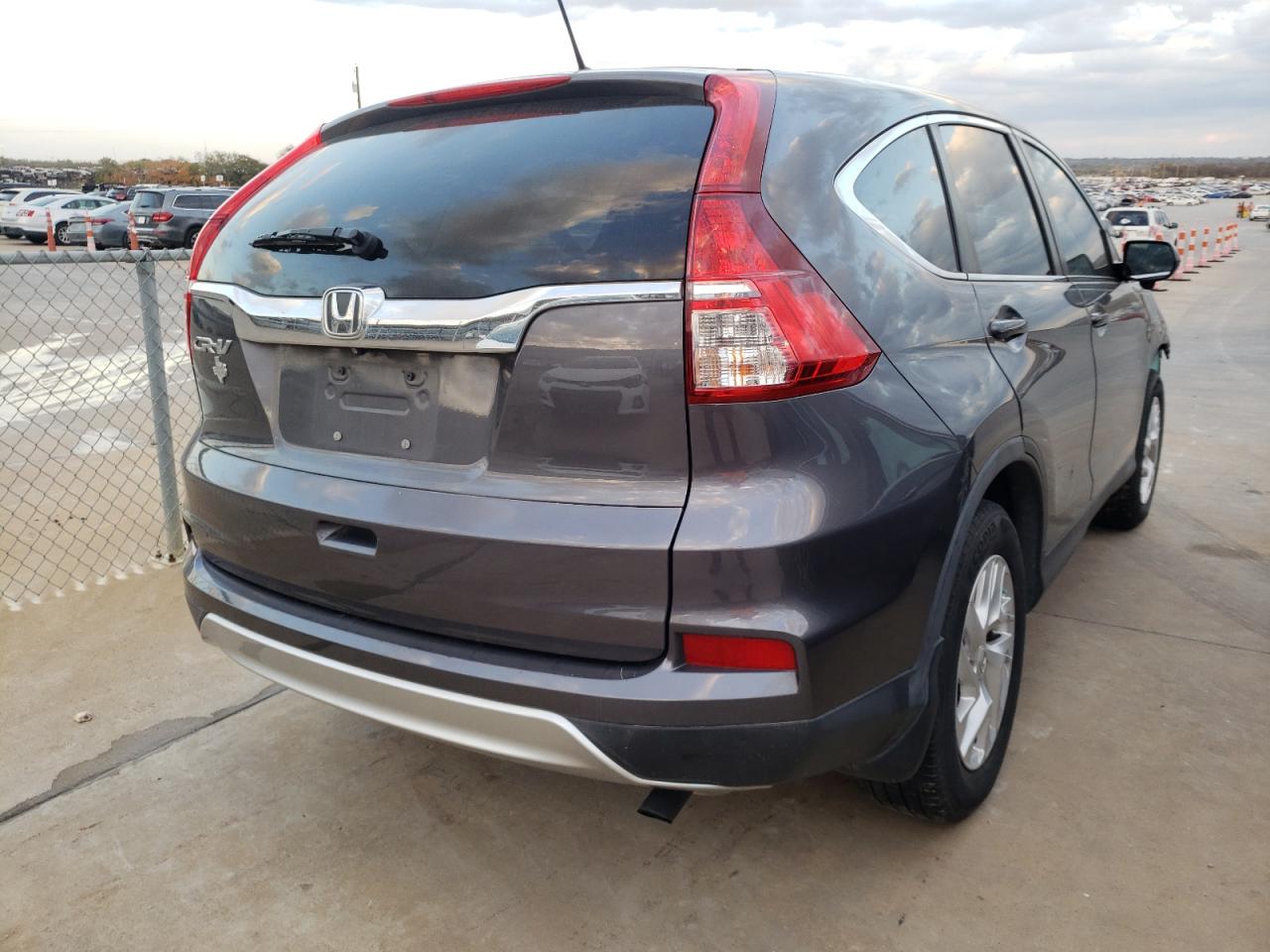 Photo 4 from auction – 2015 HONDA CR-V EX with VIN 3CZRM3H58FG706578