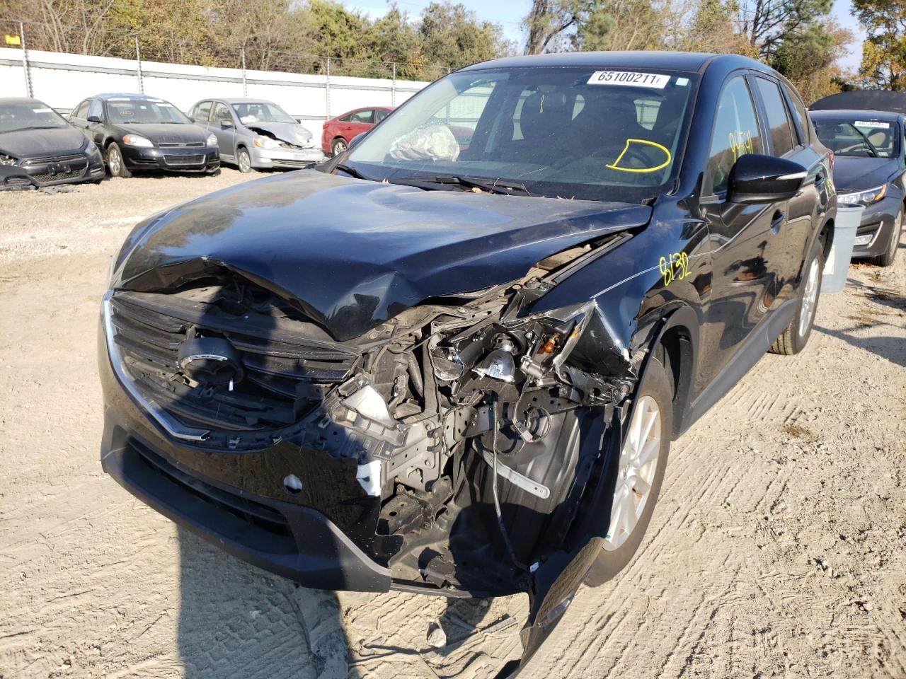 Photo 2 from auction – 2016 MAZDA CX-5 TOURI with VIN JM3KE4CY0G0629682