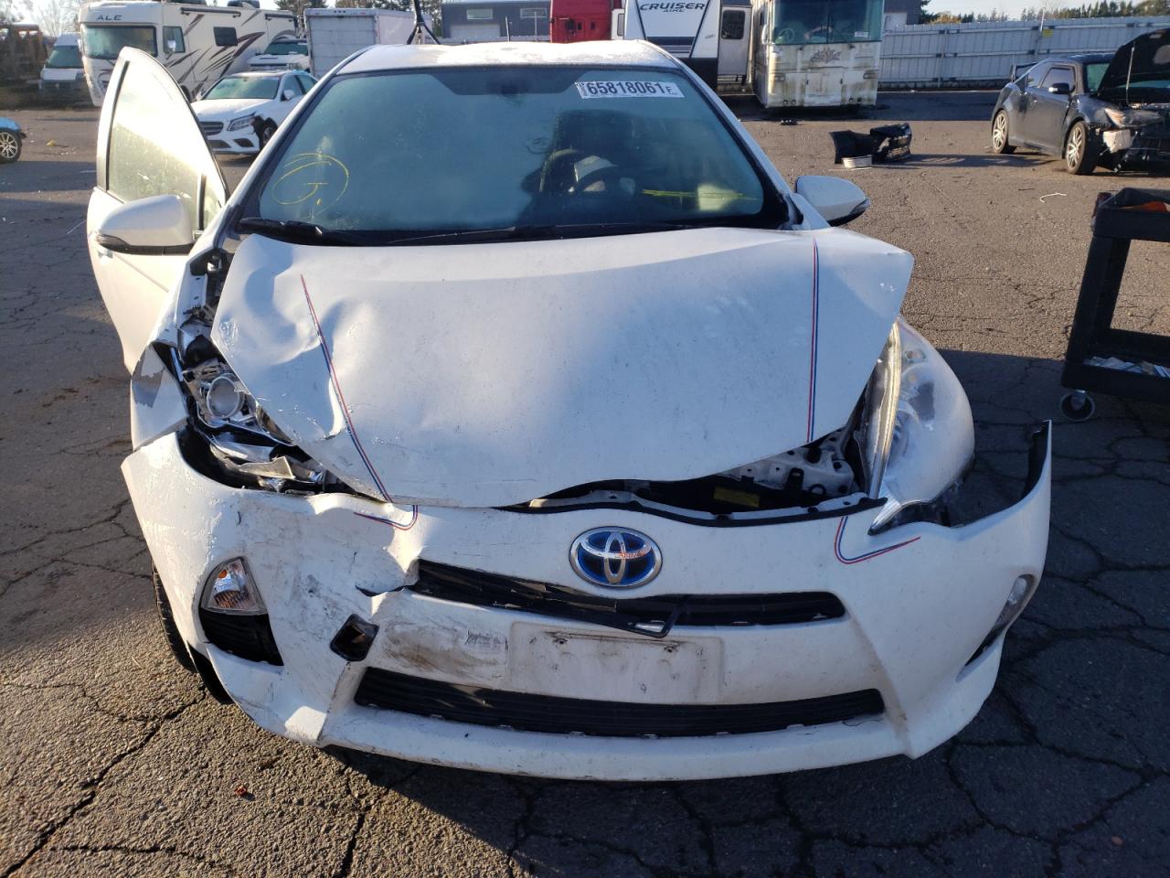 Photo 9 from auction – 2013 TOYOTA PRIUS C with VIN JTDKDTB34D1533605