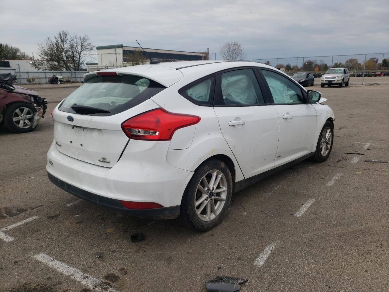 Photo 4 from auction – 2016 FORD FOCUS SE with VIN 1FADP3K23GL338357