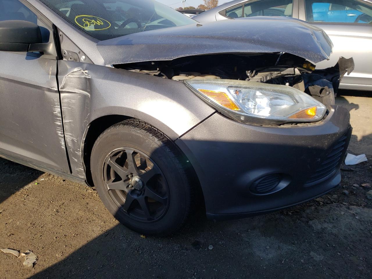 Photo 10 from auction – 2013 FORD FOCUS S with VIN 1FADP3E21DL136477