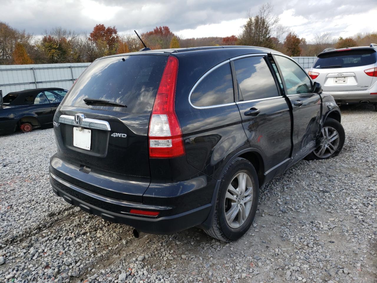 Photo 4 from auction – 2011 HONDA CR-V EXL with VIN 5J6RE4H78BL026181
