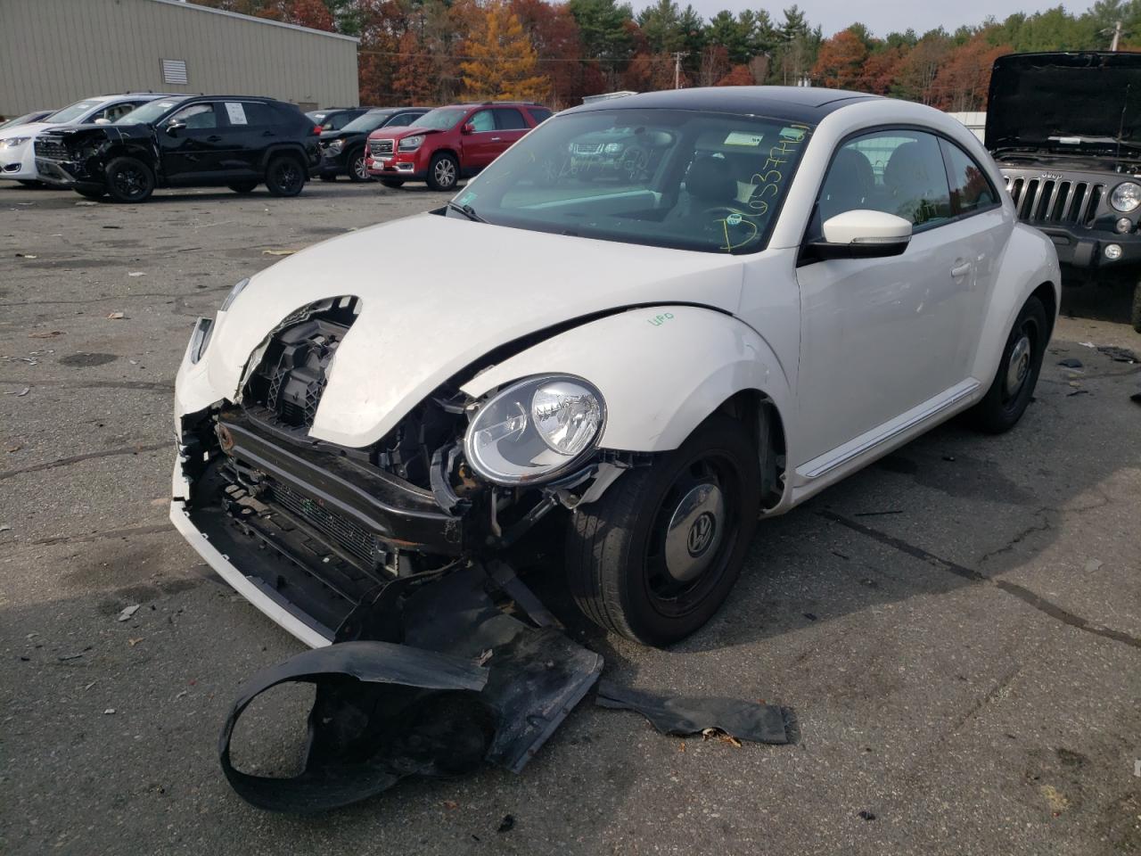 Photo 2 from auction – 2012 VOLKSWAGEN BEETLE with VIN 3VWHP7AT9CM654588