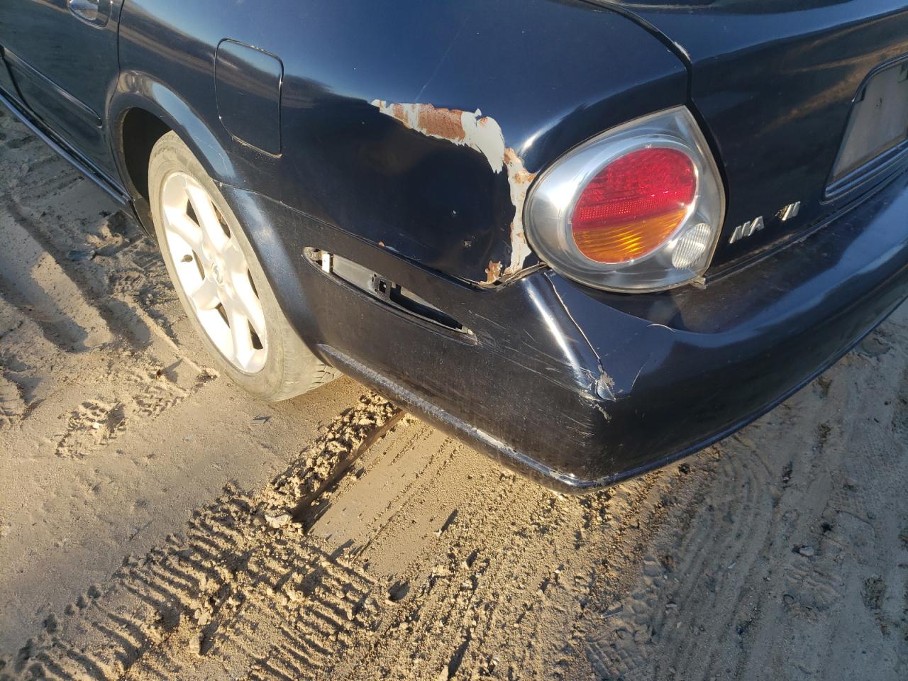 Photo 10 from auction – 2000 NISSAN MAXIMA GLE with VIN JN1CA31D2YT547099