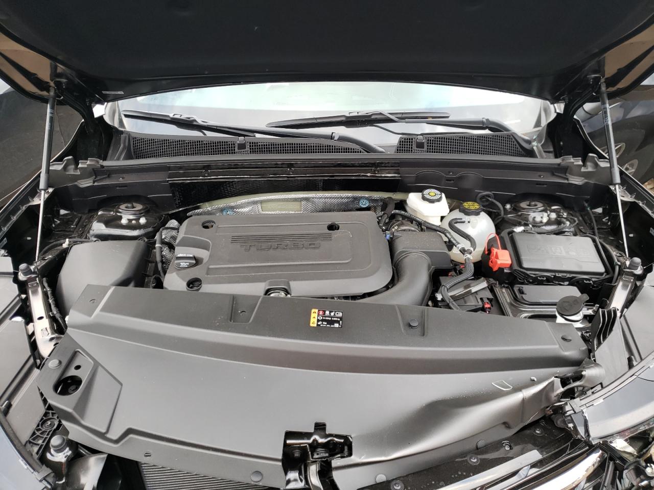 Photo 7 from auction – 2021 BUICK ENVISION with VIN LRBFZMR45MD193434