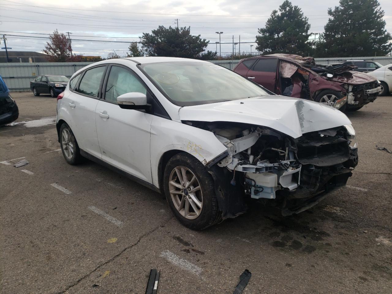 FORD FOCUS SE 2016 with VIN 1FADP3K23GL338357 - Photo from auction