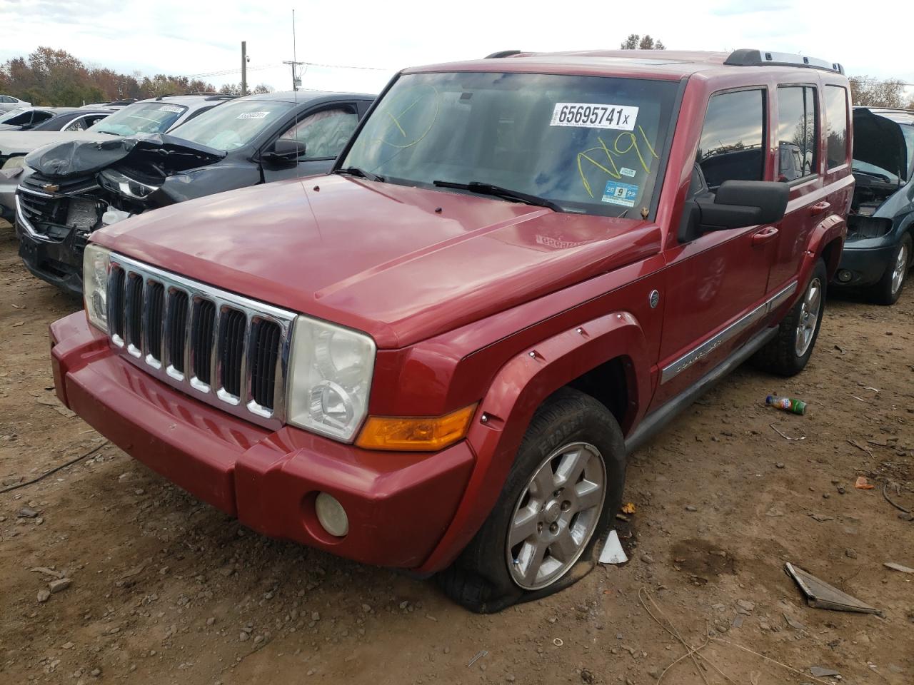 Photo 2 from auction – 2006 JEEP COMMANDER with VIN 1J8HG58206C225519