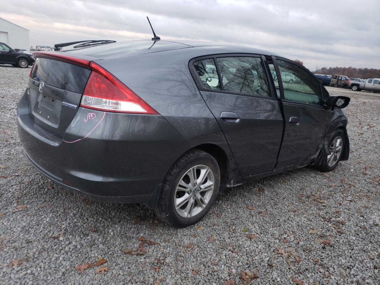 Photo 4 from auction – 2010 HONDA INSIGHT EX with VIN JHMZE2H74AS026577