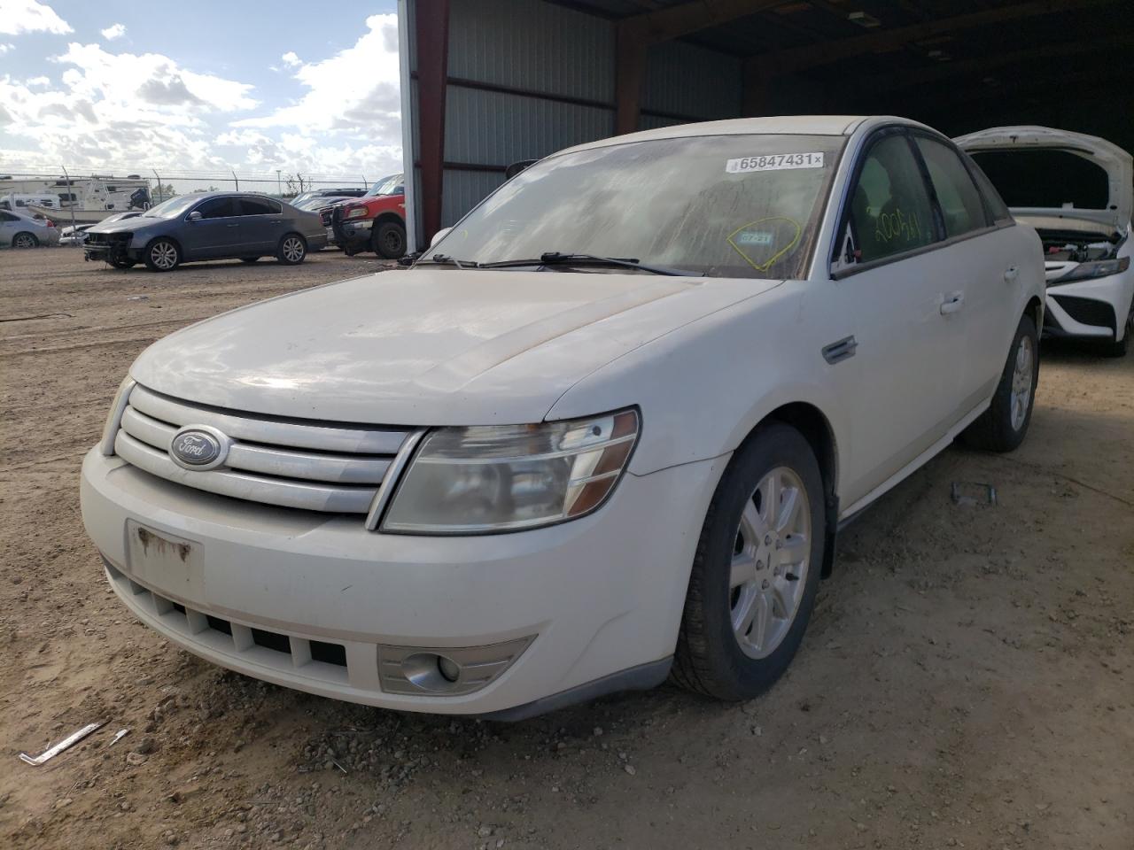 Photo 2 from auction – 2009 FORD TAURUS with VIN 1FAHP23W89G116633