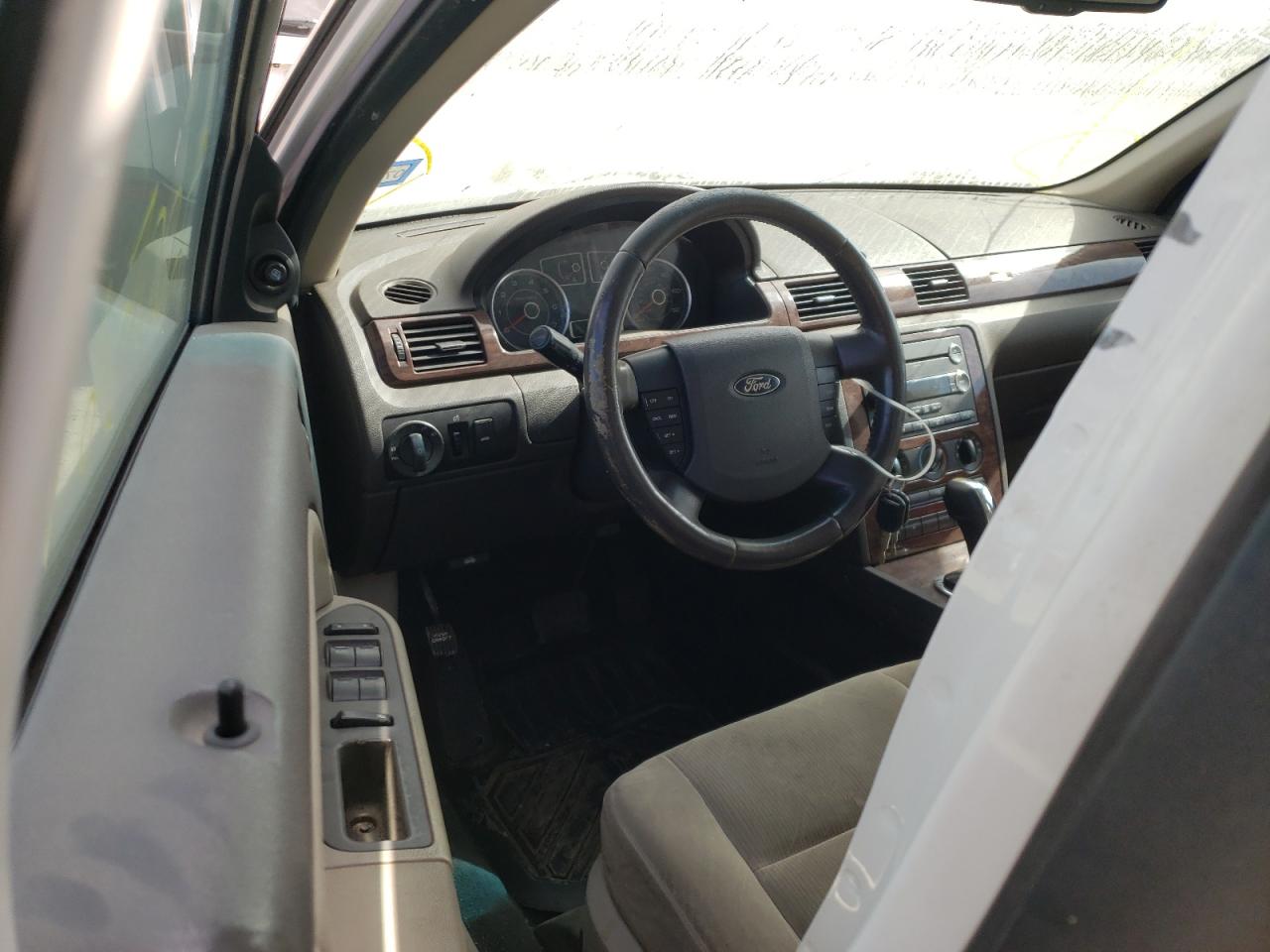 Photo 9 from auction – 2009 FORD TAURUS with VIN 1FAHP23W89G116633