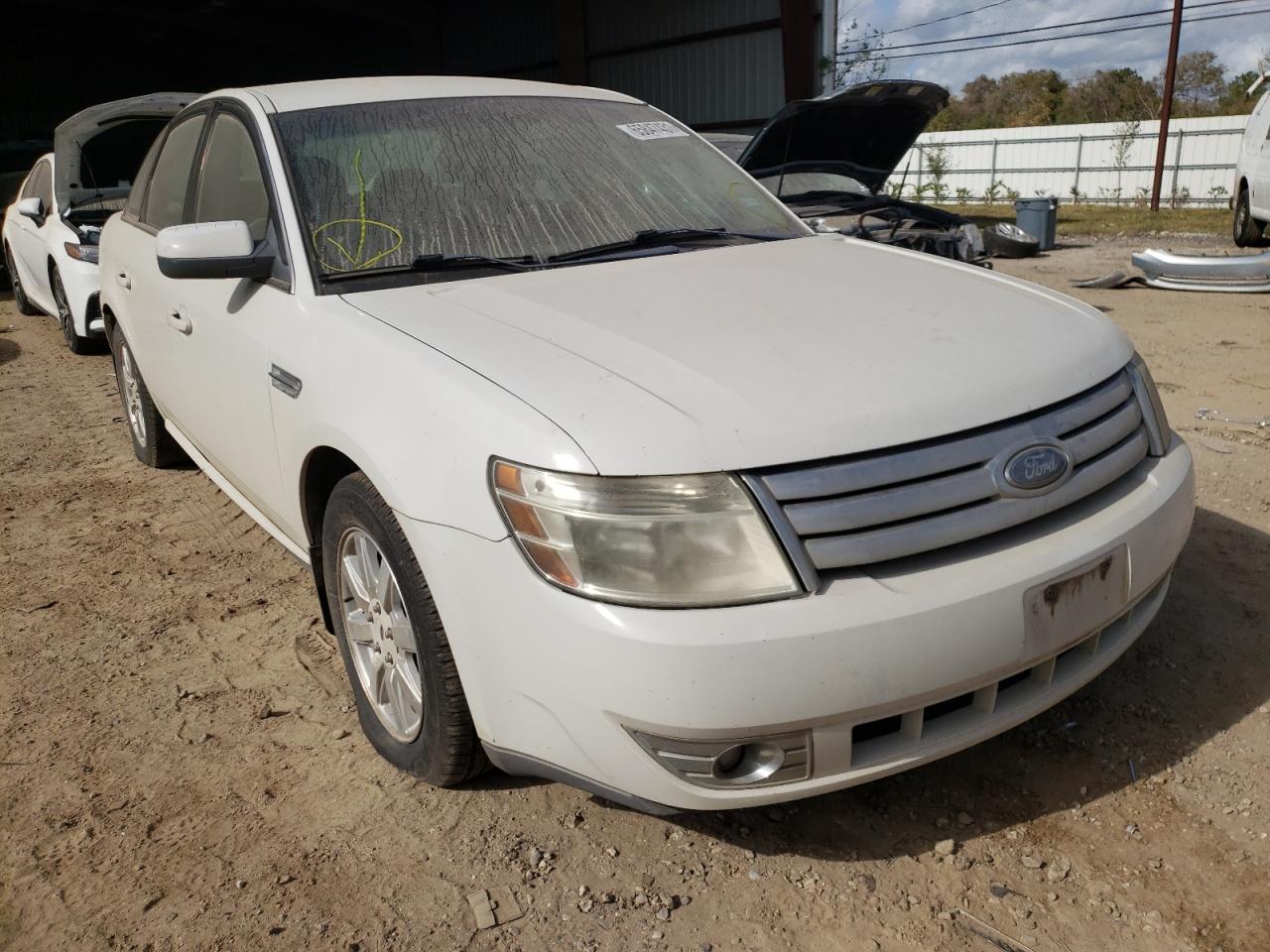 FORD TAURUS 2009 with VIN 1FAHP23W89G116633 - Photo from auction