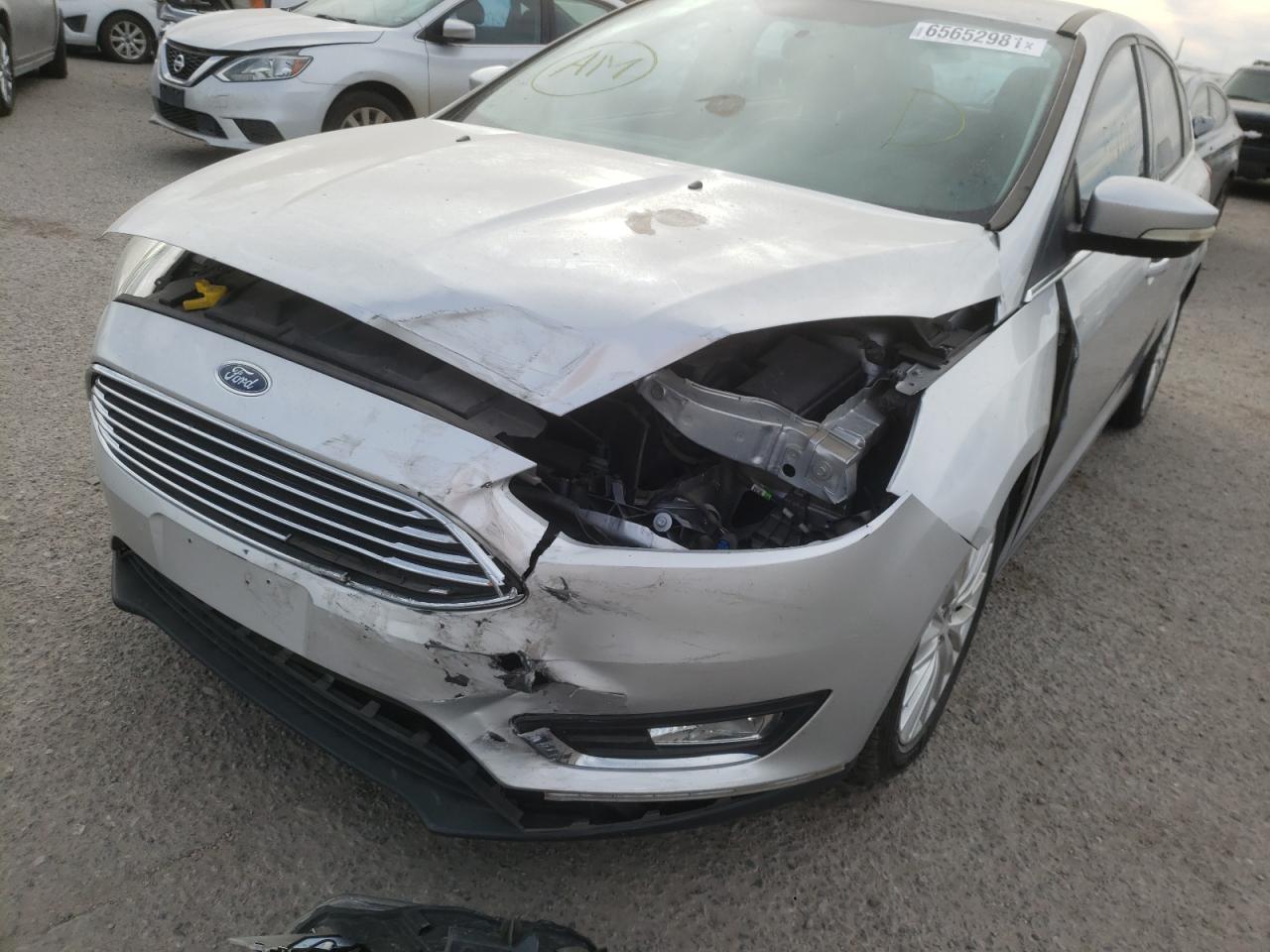 Photo 9 from auction – 2016 FORD FOCUS TITA with VIN 1FADP3N28GL400072