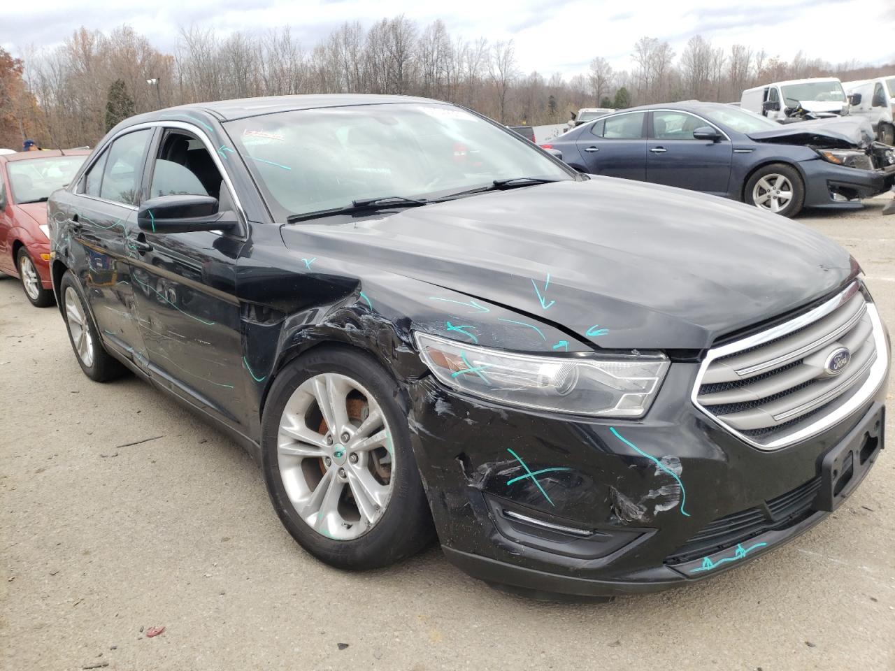 FORD TAURUS SEL 2014 with VIN 1FAHP2H88EG119326 - Photo from auction