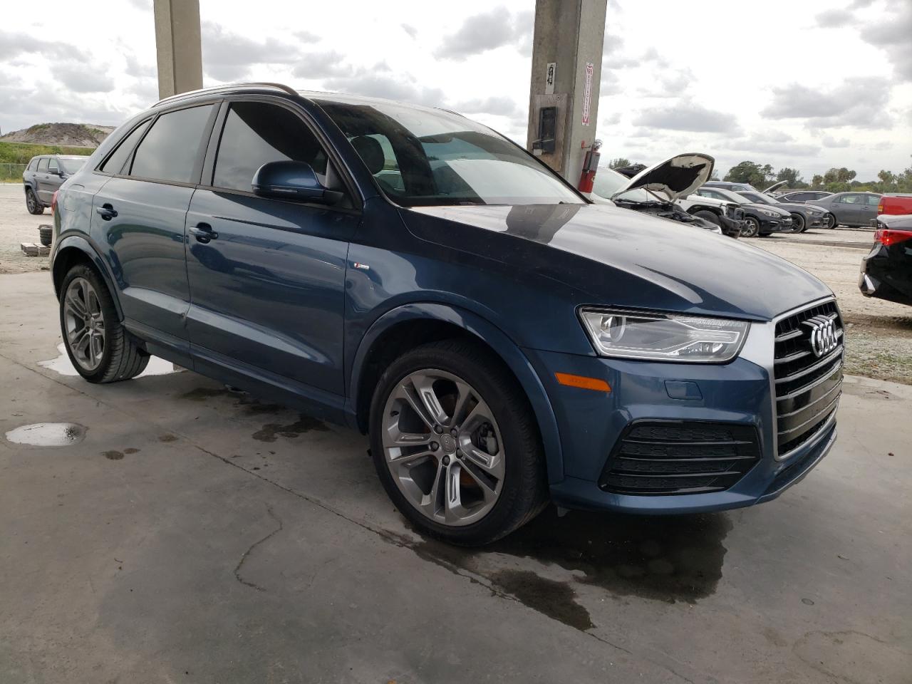 AUDI Q3 PREMIUM 2018 with VIN WA1BCCFS6JR004071 - Photo from auction