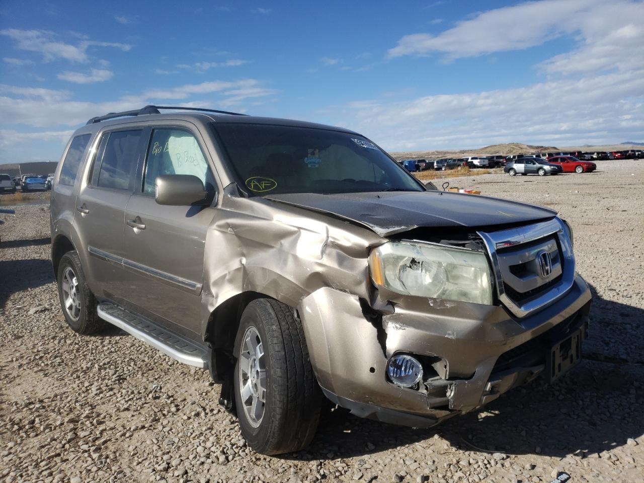 Photo 1 from auction – 2010 HONDA PILOT TOUR with VIN 5FNYF4H91AB035743