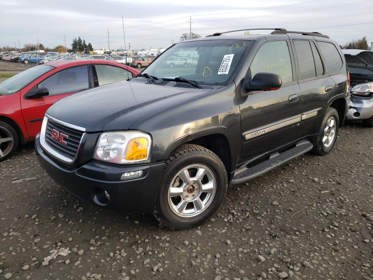 Photo 2 from auction – 2003 GMC ENVOY with VIN 1GKDT13S032388310