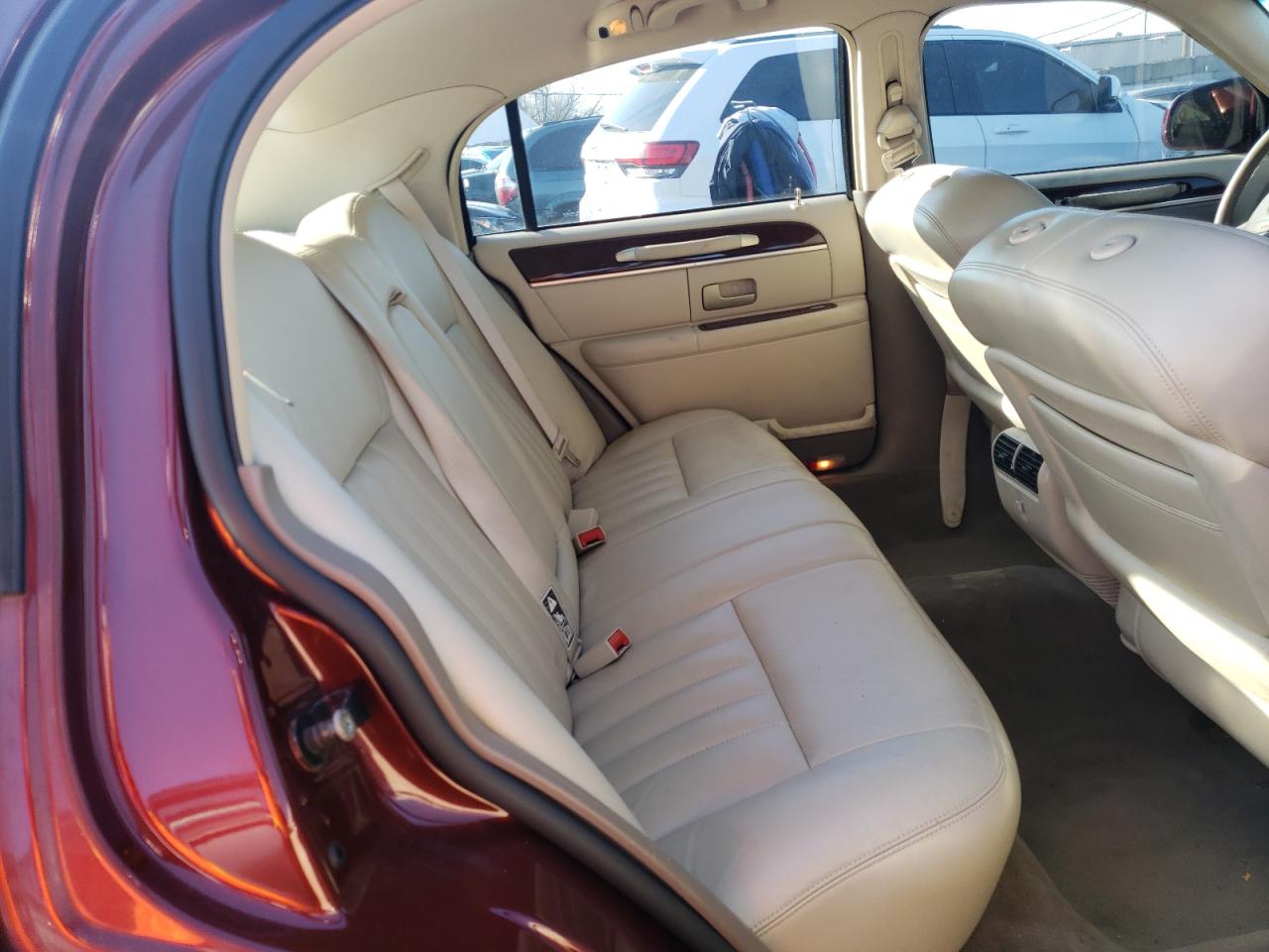 Photo 6 from auction – 2004 LINCOLN TOWN CAR E with VIN 1LNHM81W04Y606491