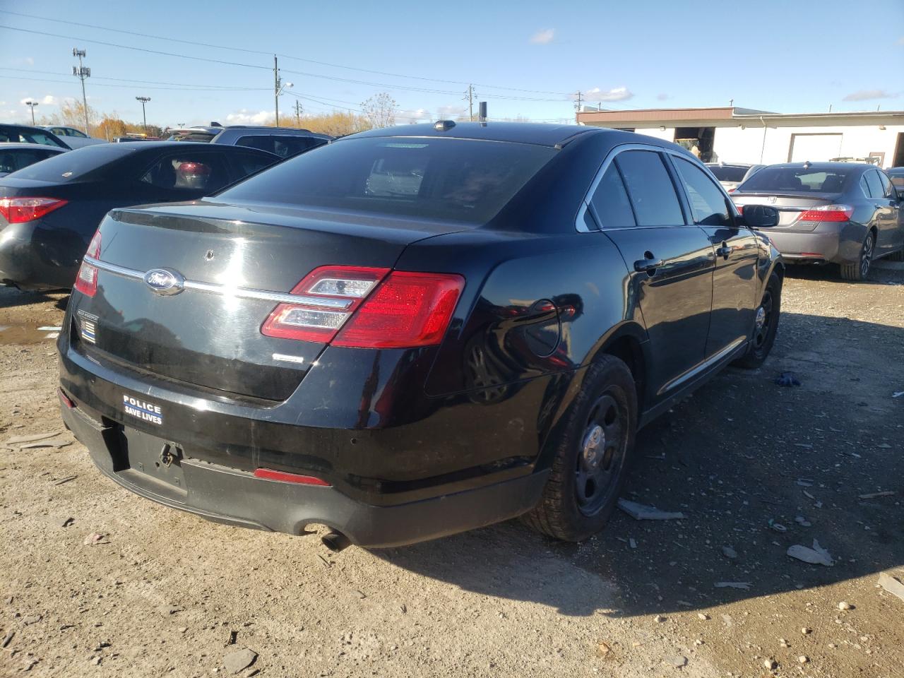 Photo 4 from auction – 2014 FORD TAURUS POL with VIN 1FAHP2MT6EG149063