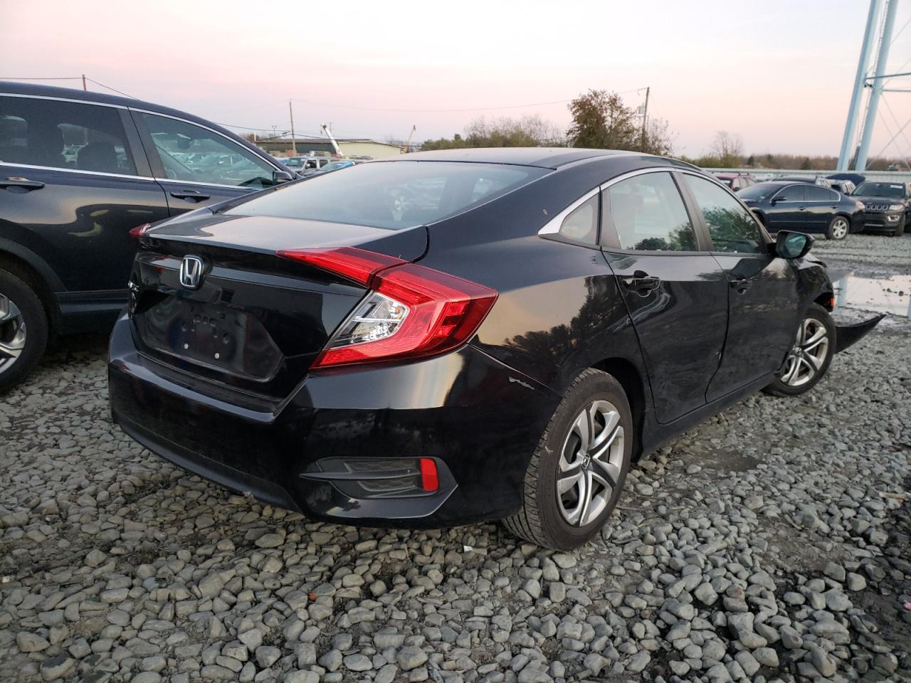 Photo 4 from auction – 2017 HONDA CIVIC LX with VIN 2HGFC2F54HH514281