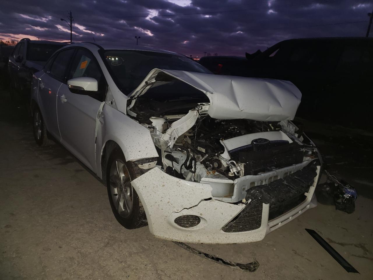 FORD FOCUS SE 2014 with VIN 1FADP3F20EL434745 - Photo from auction