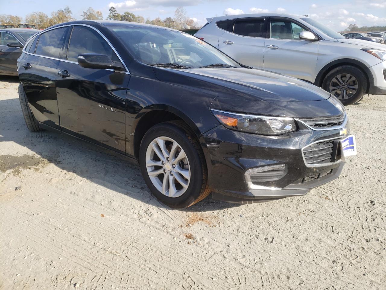 CHEVROLET MALIBU LT 2018 with VIN 1G1ZD5ST5JF164061 - Photo from auction