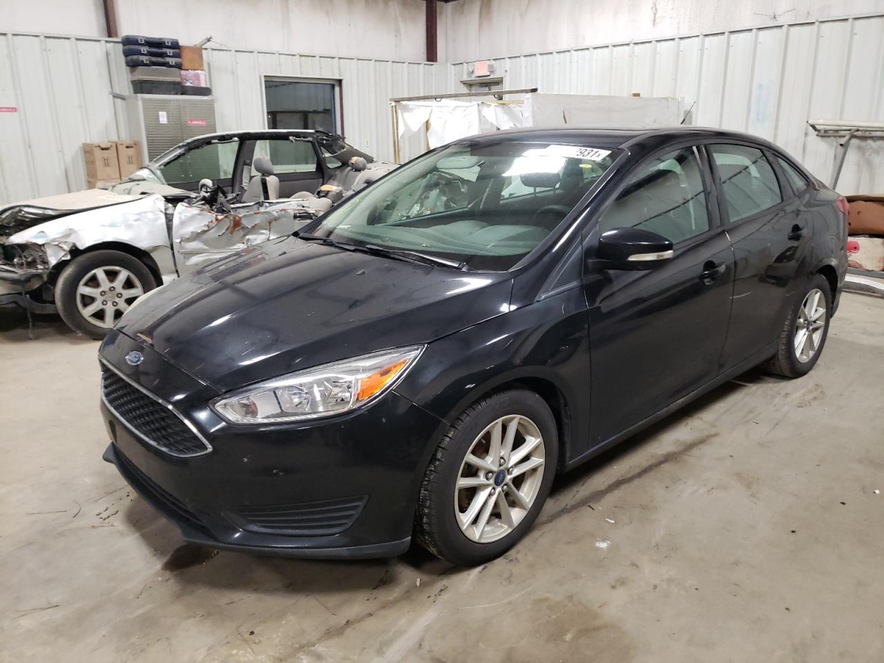 Photo 9 from auction – 2015 FORD FOCUS SE with VIN 1FADP3FE9FL381992