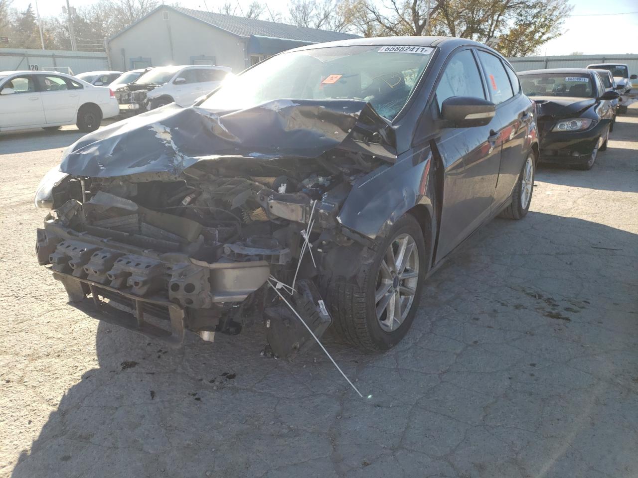 Photo 2 from auction – 2016 FORD FOCUS SE with VIN 1FADP3K26GL205088