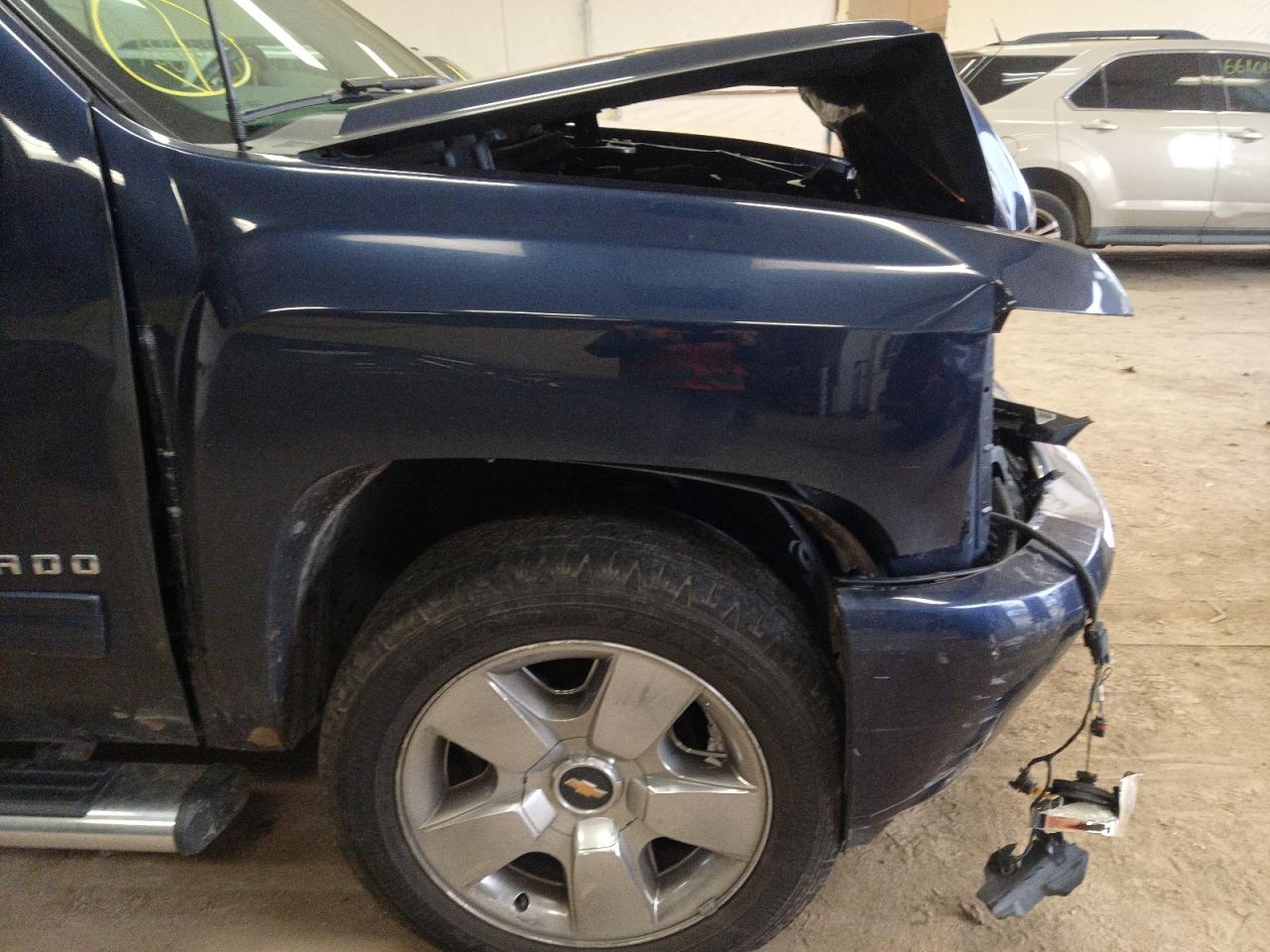 Photo 9 from auction – 2011 CHEVROLET SILVERADO with VIN 1GCRKSE31BZ174576